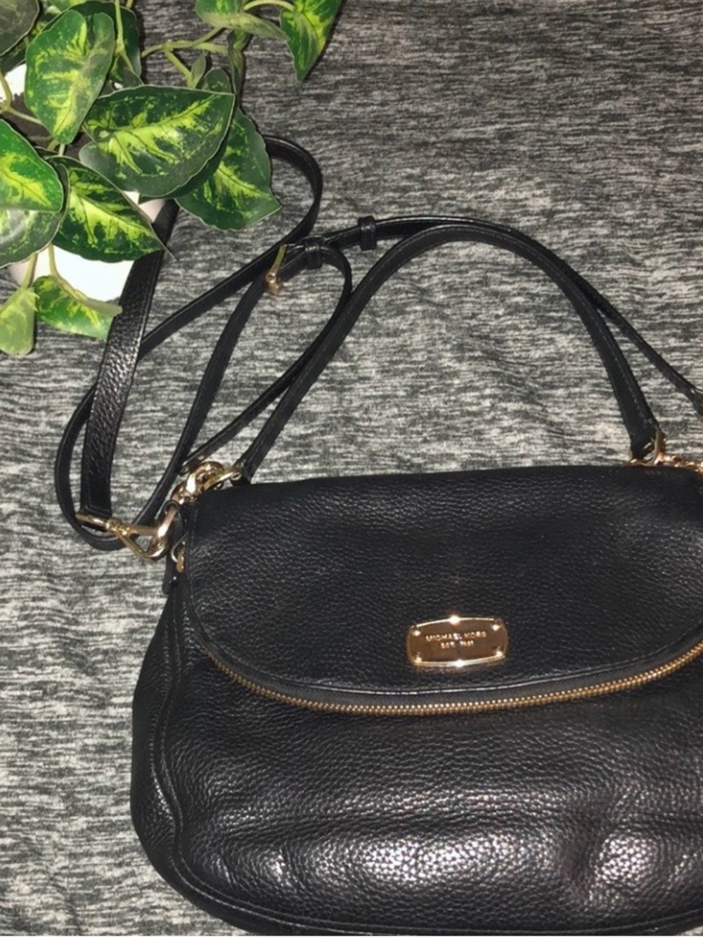 Michael Kors rounded crossbody purse with gold accents